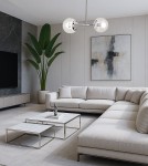 Lampa wisząca Otis 2xE27 w chromowanej oprawie, z dwoma przezroczystymi kloszami, zawieszona w nowoczesnym wnętrzu z jasną sofą i stolikami. Tło z gładkimi ścianami i dużą rośliną dodaje stylu.