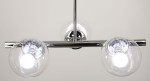 Lampa wisząca Otis z trzema dużymi, szklanymi kloszami w chromowanej oprawie. Widok z góry ukazuje metalowy wspornik oraz źródła światła E27. Klosze mają okrągły kształt, przezroczyste, z wyraźnie widocznymi żarówkami.