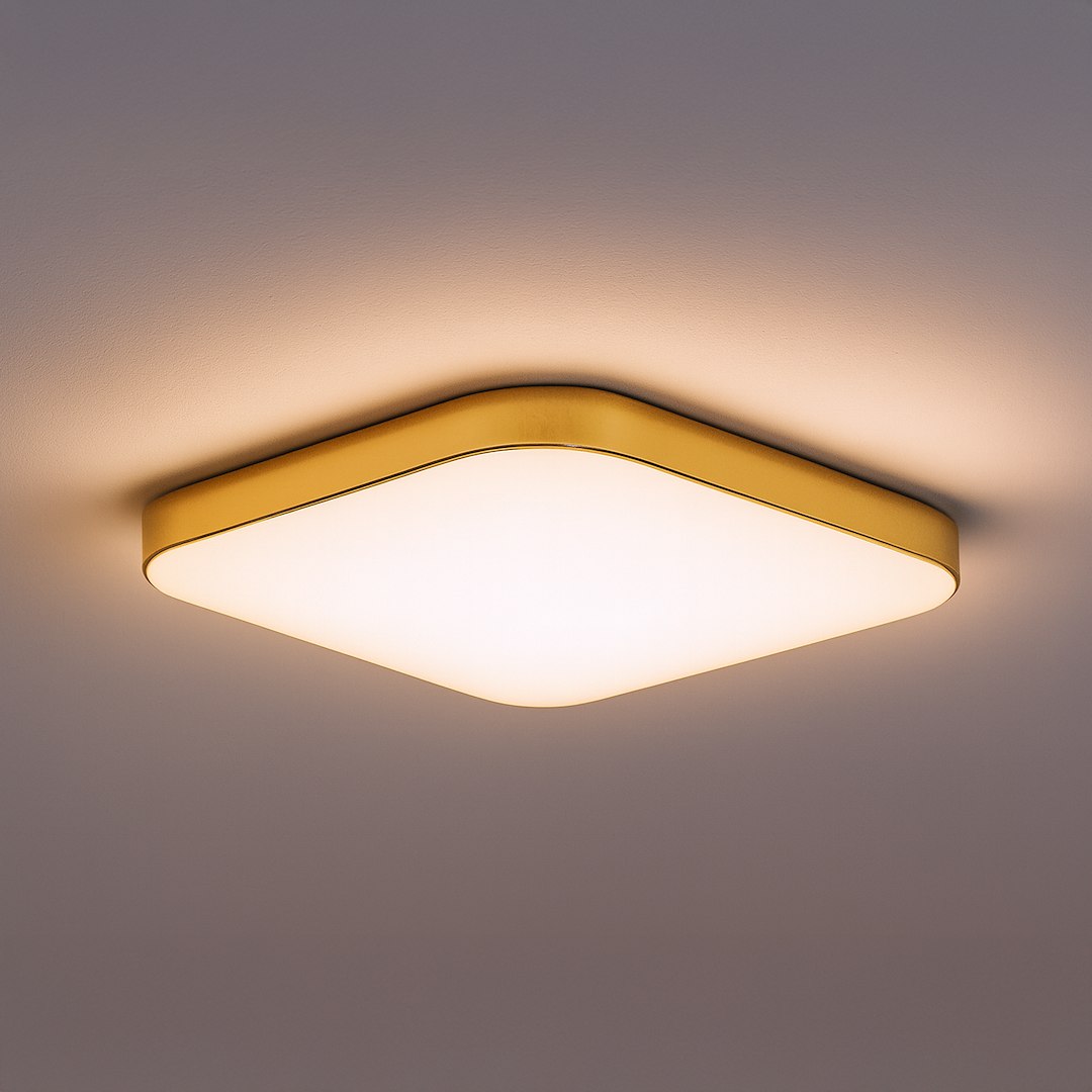 Plafon LED Nemo D33 w kolorze złotym, o kwadratowym kształcie, z matowym kloszem, o wymiarach dostosowanych do montażu sufitowego. Źródło światła o mocy 17W i temperaturze barwowej 4000K, z oznaczeniem IP44, idealny do łazienek.
