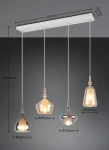 Lampa wisząca Aldea z czterema kloszami E14 w białej obudowie. Klosze o różnych kształtach: stożkowy, kulisty i dzwonowy w przezroczystym i metalicznym wykończeniu. Długość zwisu 2000 mm, szerokość 650 mm. Ujęcie frontalne.