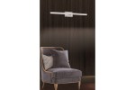 Kinkiet łazienkowy Linea L60 LED 8W 4000K IP44 w chromowanym wykończeniu, zamontowany na ciemnym tle, nad szarym fotelem. Lampa ma prostokątny kształt z elegancką, minimalistyczną konstrukcją.