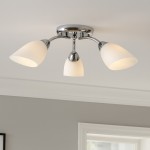 Portos lampa sufitowa 3xE14 w chromowanej obudowie z trzema kloszami w kształcie stożka, wykonanymi z matowego szkła. Lampa montowana sufitowo, z wykończeniem w eleganckim stylu, idealna do nowoczesnych wnętrz.