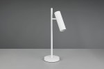 Lampa stołowa Soka w kolorze białym z oprawą 1xGU10, z okrągłą podstawą i prostym, pionowym stelażem. Kluczowy element to cylindryczny klosz z rowkowaną powierzchnią, nachylony pod kątem. Produkt na szarym tle.