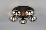 Lampa sufitowa Divina z pięcioma oprawami E14, w kolorze czarnym, z przydymionymi, metalicznymi kloszami. Montowana na suficie, o okrągłej podstawie, z połyskującymi detalami, idealna do nowoczesnych wnętrz.