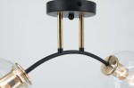 Lampa sufitowa Elba z dwoma oprawami E27, w kolorze czarnym i złotym. Ujęcie z boku, pokazujące okrągły sufitowy uchwyt oraz łukowate rury. Widać przezroczyste klosze, które eksponują żarówki. Tło białe, proste.