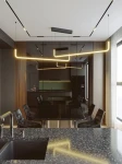 Czarna lampa wisząca Urus z dwoma źródłami LED o mocy 30W, z nowoczesnym, minimalistycznym kształtem. Ujęcie z góry w stylowej kuchni, z elementami drewnianymi i czarnym stołem. Jasne światło LED tworzy efektowną atmosferę.