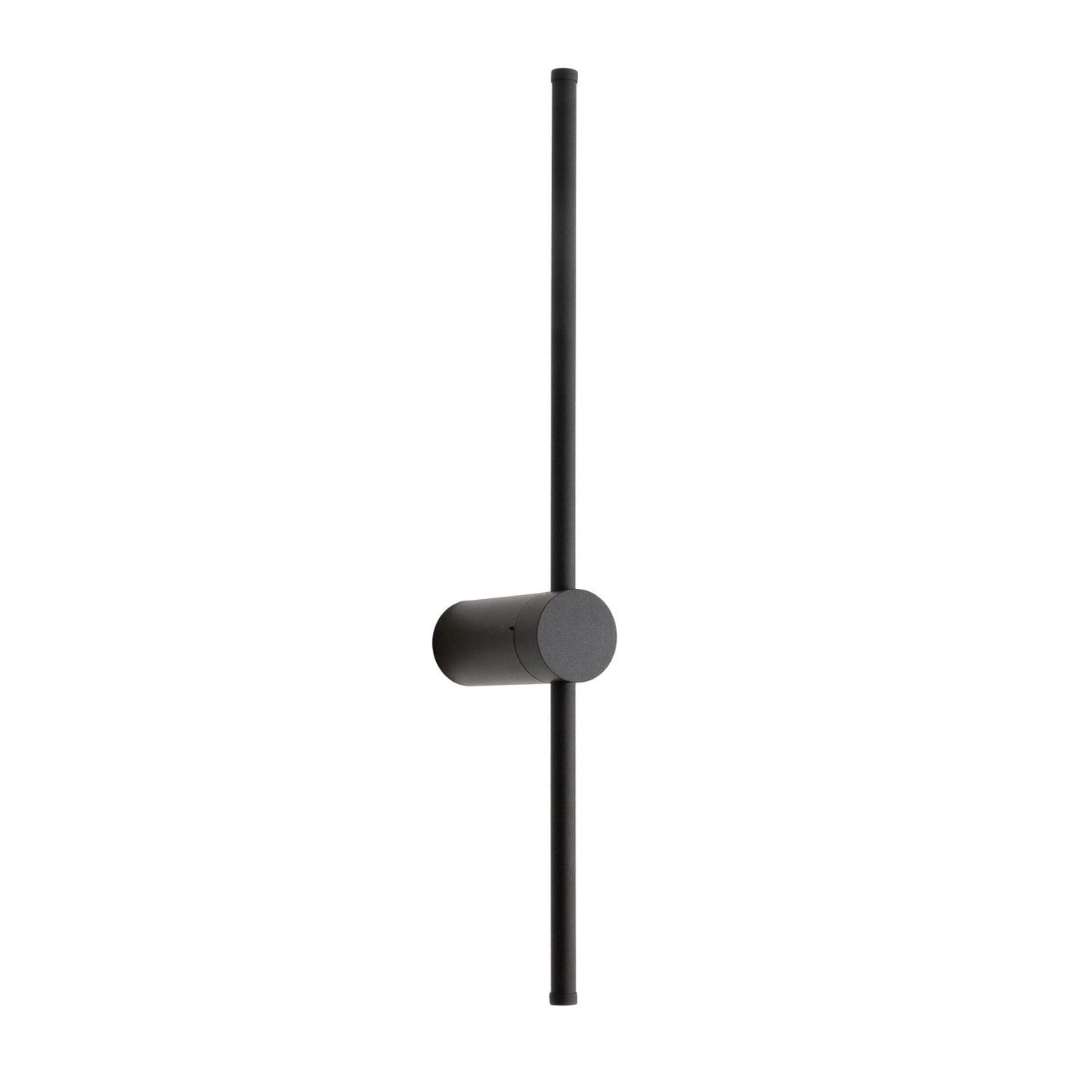 Kinkiet Spirit 1xLED 9W w kolorze czarnym, o minimalistycznym designie. Posiada prostą, pionową konstrukcję z okrągłym mocowaniem. Ujęcie frontalne, produkt zamontowany na ścianie, na białym tle.
