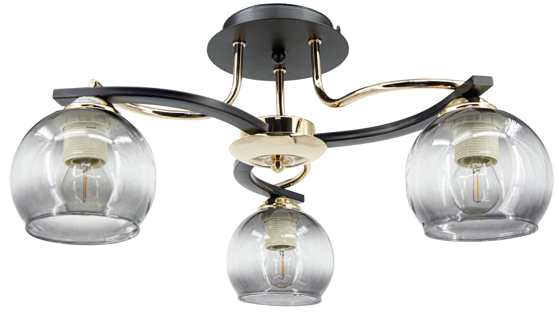 Lampa sufitowa Cleo 3xE27 w kolorze czarnym i złotym. Posiada trzy przezroczyste klosze w kształcie kul, osadzone na eleganckiej metalowej konstrukcji. Ujęcie z dołu, pokazujące detale mocowania i kształt kloszy.