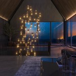 Lampa wisząca Palloncini z 11 żarówkami LED o mocy 66W, w kolorze białym z multikolorowymi akcentami. Zawieszona w nowoczesnym wnętrzu, z efektownym układem świetlnym, w otoczeniu dużych okien i minimalistycznych mebli.