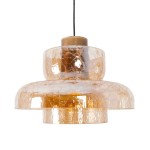 Lampa wisząca Signature z mosiężnym wykończeniem, z dwoma przezroczystymi, falistymi kloszami w kolorze bursztynowym. Zawieszona na czarnym przewodzie, z pojedynczym źródłem LED 8W. Kształt owalny, z widoczną strukturą materiału.