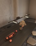 Lampa wisząca Ibiza 4xLED 32W w kolorze czarnym, zawieszona nad drewnianym stołem. W tle widoczny wazon z suszonymi kwiatami oraz talerz z czerwonymi jabłkami. Kabel zasilający zwisa z sufitu, a lampa ma minimalistyczny design.