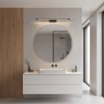 Kinkiet Klimt L60 LED 12W CCT IP44 w kolorze czarnym, zamontowany nad umywalką w nowoczesnej łazience. Oświetlenie emituje przyjemne światło, a jego minimalistyczny design harmonizuje z okrągłym lustrem i jasnym blatem.
