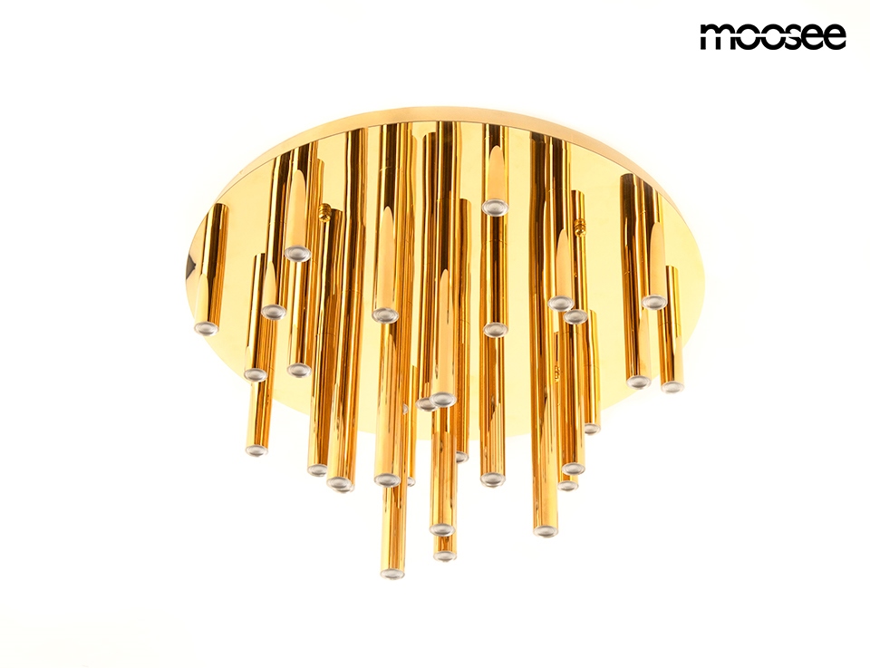 Lampa sufitowa Organo o średnicy 33 cm, wykonana z materiału w kolorze złotym. Posiada 30 diod LED o ciepłej barwie 3000K. Montowana na suficie, charakteryzuje się nowoczesnym, minimalistycznym designem z wiszącymi elementami.