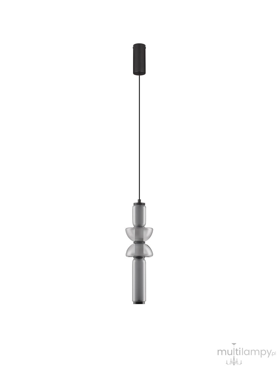 Lampa wisząca Glorica w kolorze czarnym z jednym źródłem światła LED 15W. Zawieszona na cienkim przewodzie, z przezroczystymi elementami w kształcie cylindrów i talerzyków, prezentująca nowoczesny design.