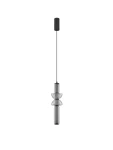 Lampa wisząca Glorica w kolorze czarnym z jednym źródłem światła LED 15W. Zawieszona na cienkim przewodzie, z przezroczystymi elementami w kształcie cylindrów i talerzyków, prezentująca nowoczesny design.