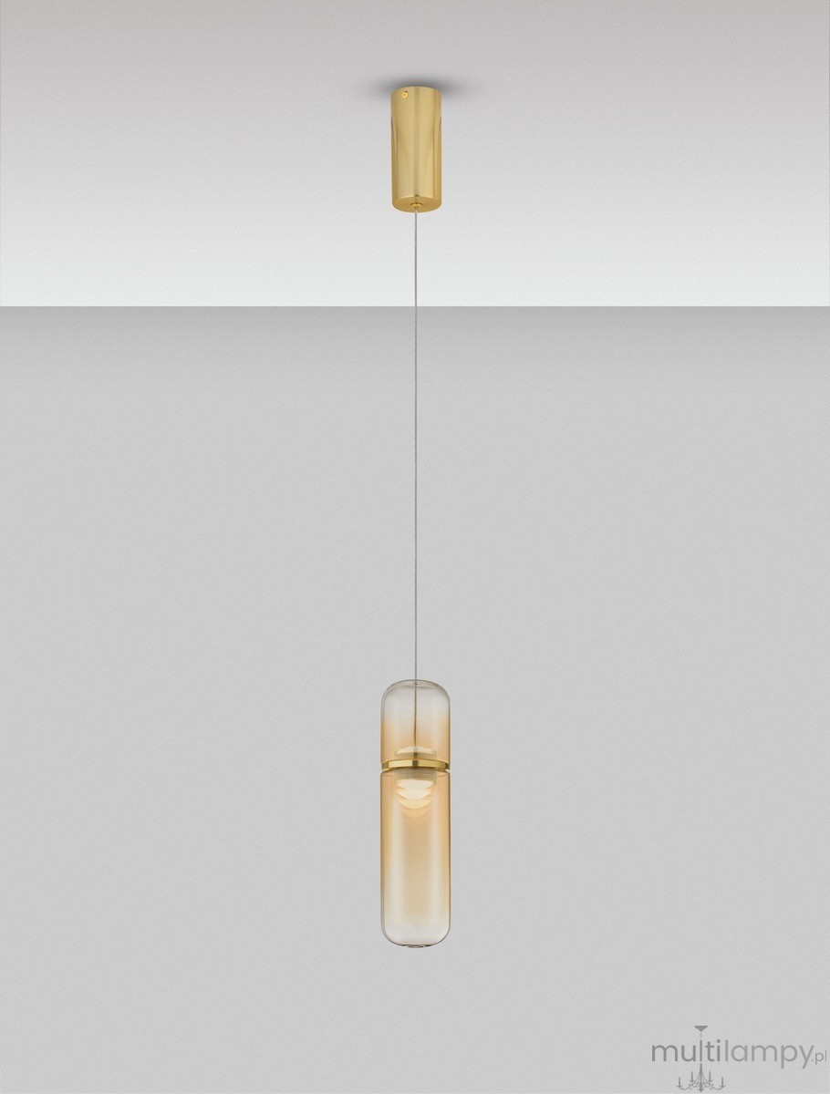 Złota lampa wisząca Rebalvo 1xLED 7W, z przezroczystym kloszem w kształcie walca, zawieszona na cienkim przewodzie. Ujęcie frontalne, ukazujące elegancki design oraz źródło światła wewnątrz klosza. Tło jednolite, szare.