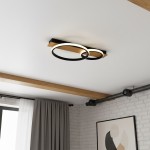 Lampa sufitowa LED Rowena 14W 4000K w kolorze czarnym z dwoma okrągłymi pierścieniami na drewnianej podstawie, zamontowana na białym suficie. W tle widoczne zasłony i ściana z białej cegły.
