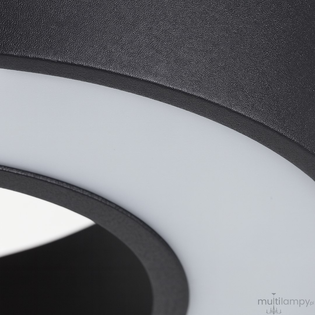 Czarna lampa wisząca LED Union 40W CCT z okrągłym kloszem, w którym widoczne są detale czarnej, matowej powierzchni oraz biała oprawa. Zbliżenie na krawędź lampy, podkreślające teksturę i kształt.