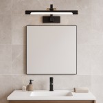 Kinkiet Vinci L40 LED 12W w kolorze czarnym, montowany na ścianie, z prostą, poziomą oprawą. Oświetlenie ma neutralną temperaturę barwową 4000K, idealne do łazienki. W tle widoczna umywalka z akcesoriami i lustrem.