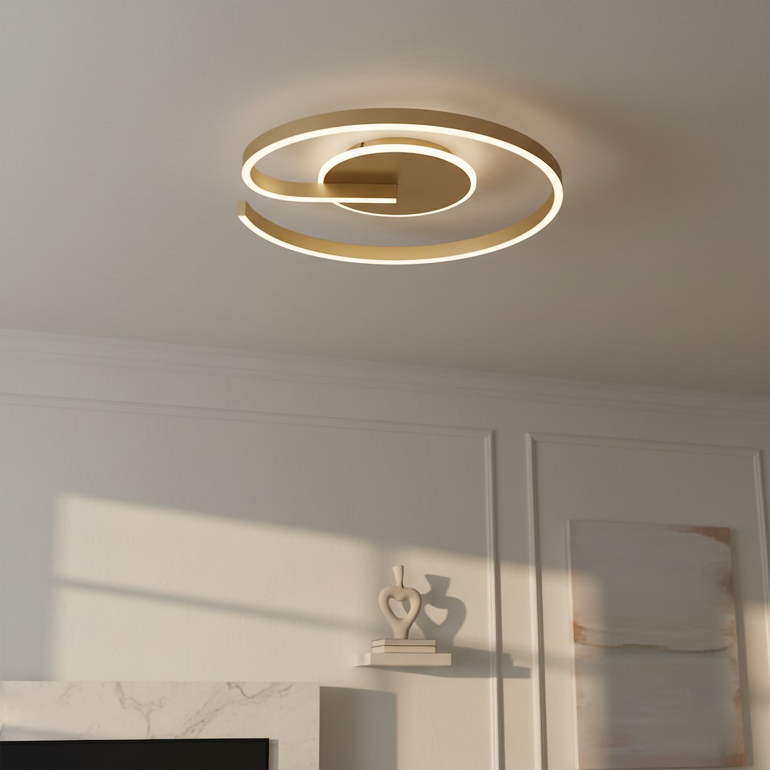 Lorenzo lampa sufitowa LED 22W 4000K w kolorze złotym, o nowoczesnym, spiralnym kształcie, montowana na suficie. Źródło światła LED emituje neutralne światło, idealna do aranżacji wnętrz. Widok z dołu, w jasnym otoczeniu.