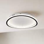 Cali Round lampa sufitowa LED 30W 4000K w okrągłym kształcie, z białym, matowym kloszem i czarnym obrzeżem. Stojąca na suficie, minimalistyczna konstrukcja, idealna do nowoczesnych wnętrz.