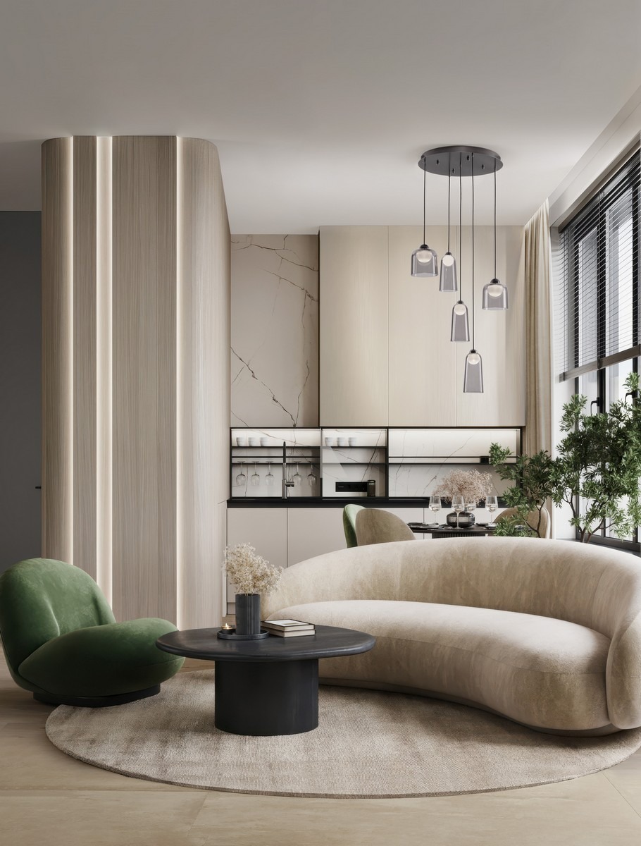 Lampa wisząca Tavenco z pięcioma kloszami LED 24W w kolorze czarnym, zawieszona na okrągłym, metalowym stelażu. Klosze mają cylindryczny kształt i są przezroczyste, co podkreśla elegancki design. Lampa umieszczona w nowoczesnym wnętrzu z jasnymi meblami.