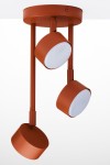 Lampa wisząca Nemo 3xGX53 w ceglastym kolorze, z trzema okrągłymi kloszami, zawieszona na prostych rurkach. Klosze mają matowe wykończenie, a lampa jest zamontowana na okrągłej podstawie. Ujęcie z dołu, podkreślające kształt i kolorystykę.