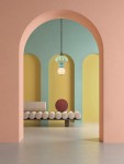 Lampa wisząca Casurno 1xLED 8W w kolorze czarnym, z multikolorowymi kloszami w kształcie kul, zawieszona na cienkim przewodzie. Widoczna w minimalistycznym wnętrzu z pastelowymi ścianami i nowoczesną sofą.