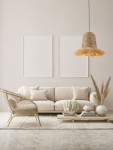Lampa wisząca Fanliza 1xE27 w kolorze czarnym, wykonana z hiacyntu wodnego, z plecionym kloszem i szerokim daszkiem. Zawieszona na cienkim kablu w jasnym wnętrzu, nad jasną sofą z poduszkami.