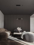 Czarna lampa wisząca Carenso z pojedynczym źródłem LED 29W, okrągła konstrukcja z metalowym wykończeniem, zawieszona na cienkich linkach, w nowoczesnym wnętrzu z sofą, stolikiem i dekoracjami. Tło w stonowanych kolorach.