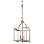 Lampa wisząca Larkin S, 2xE14, w szczotkowanym niklu. Konstrukcja w formie szklanej klatki z dwiema żarówkami, zawieszona na łańcuchu. Stylowy, kwadratowy kształt z eleganckimi detalami.