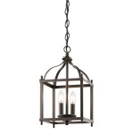Lampa wisząca Larkin S w odcieniu stary brąz, z metalową konstrukcją w kształcie sześcianu. Posiada dwa źródła światła E14, zamontowane na okrągłej podstawie, zawieszona na łańcuchu. Elegancki detal w stylu klasycznym.