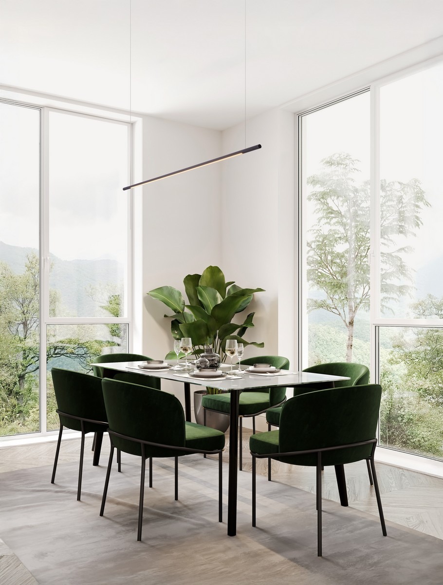 Lampa wisząca Monterzo 1xLED 20W CCT w kolorze czarnym, umieszczona nad stołem w jadalni. Surowy, prostokątny kształt z delikatnym światłem LED, zawieszona na cienkich linkach. W tle widoczna roślina oraz okna z widokiem na zewnątrz.
