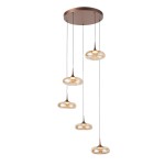 Lampa wisząca Tenele 35W 3000K w miedzi, z pięcioma szklanymi kloszami o zaokrąglonym kształcie, zawieszona na cienkich linkach. Klosze w odcieniu przezroczystym z miedzianymi detalami, zamontowana na okrągłej podsufitce.