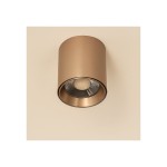 Lampa sufitowa LED 15W CCT w kolorze kawowym, cylindryczna z metaliczną obudową. Zainstalowana na suficie, z widoczną soczewką w centralnej części. Prosty, elegancki design, bez dodatkowych zdobień. Tło jasne, jednolite.