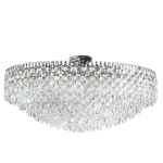 Lampa sufitowa Burano D100 o średnicy 28 cm z chromowanym wykończeniem, ozdobiona przezroczystymi kryształami. Ujęcie z dołu, ukazujące elegancki kształt i bogate detale, idealna do nowoczesnych wnętrz.