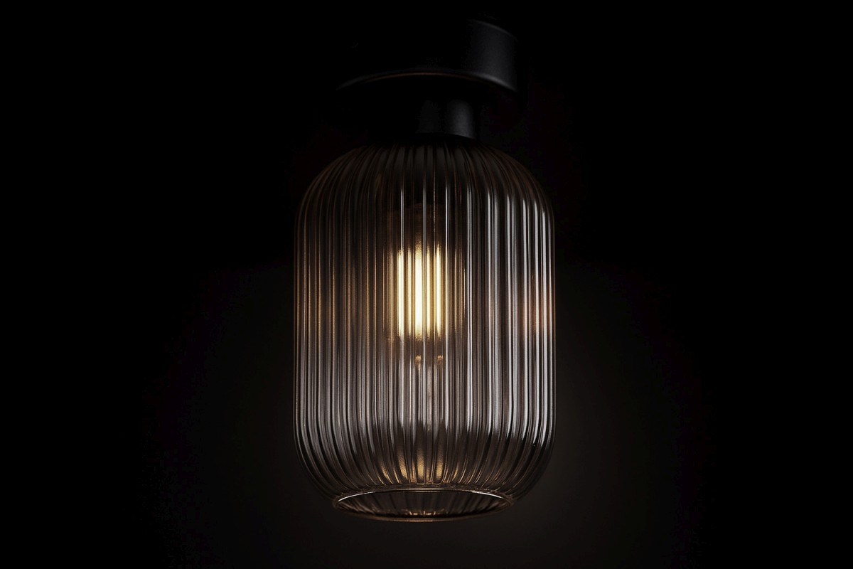 Lampa sufitowa Silva 1xE27 w kolorze czarnym i grafitowym, z żłobionym kloszem, wisząca, z widoczną żarówką w środku. Ujęcie z dołu, na jednolitym tle, podkreślające kształt i fakturę klosza.