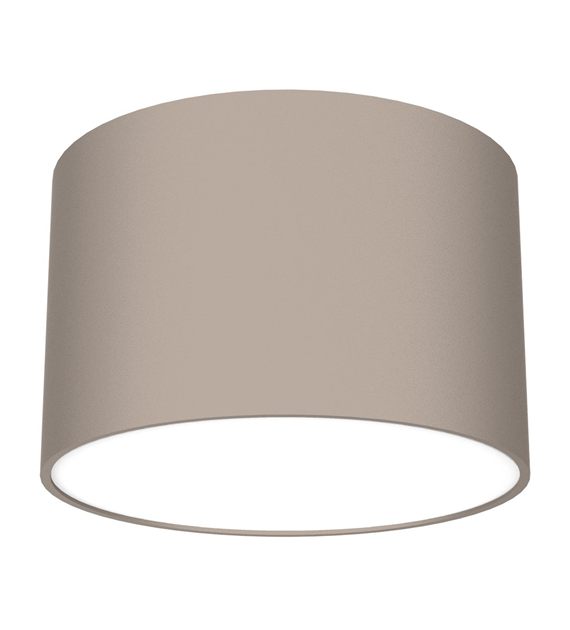 Lampa sufitowa Dixie w kolorze kaszmiru z oprawą na 1 żarówkę GX53. Ma cylindryczny kształt, matową powierzchnię i jest zamontowana w pozycji wiszącej, z białym wnętrzem dla lepszego rozproszenia światła.