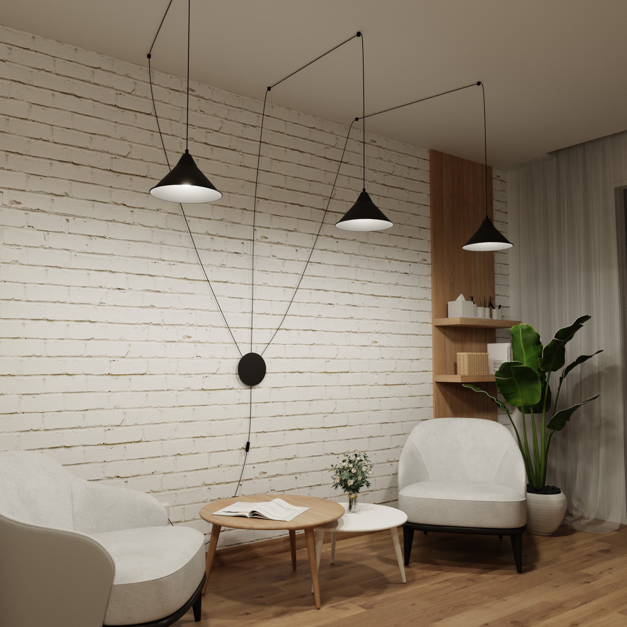 Lampa wisząca Abramo 3-punktowa w kolorze czarnym, z trzema stożkowymi kloszami na długich przewodach. Ujęcie z przodu, zawieszona w nowoczesnym wnętrzu z białą ceglaną ścianą, drewnianymi meblami i roślinami.