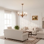 Żyrandol świecznikowy Velita w kolorze patyny, z czterema miejscami na żarówki E14. Zawieszony w jasnym pomieszczeniu, otoczony eleganckimi meblami w odcieniach bieli i beżu, tworzy stylowy akcent w aranżacji wnętrza.