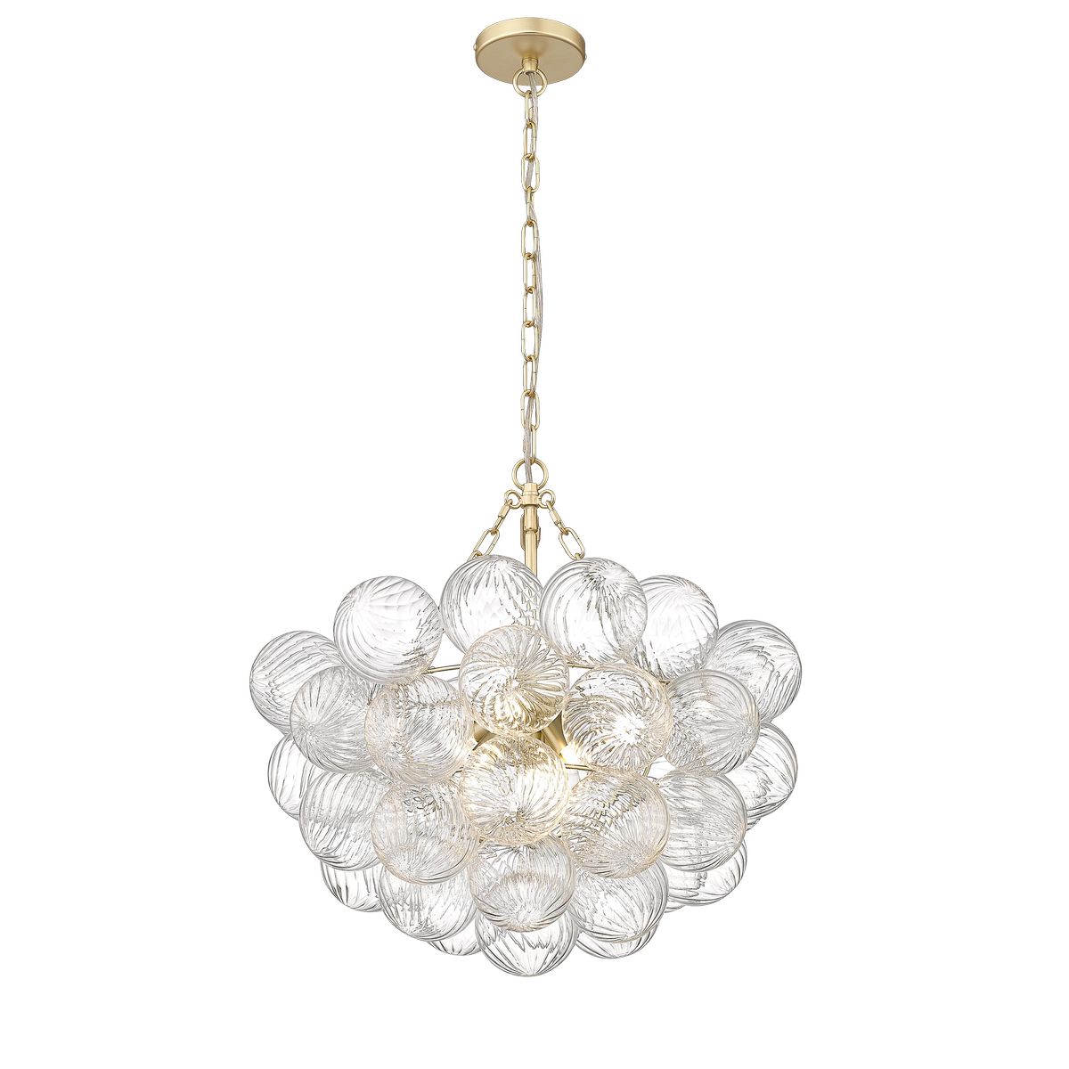 Lampa wisząca Como z 7 żarówkami G9, w złotym matowym wykończeniu. Okrągła konstrukcja z przezroczystymi, szklanymi kulami o teksturowanej powierzchni, zwisająca na łańcuchu. Wisząca, nowoczesna forma, idealna do aranżacji wnętrz.