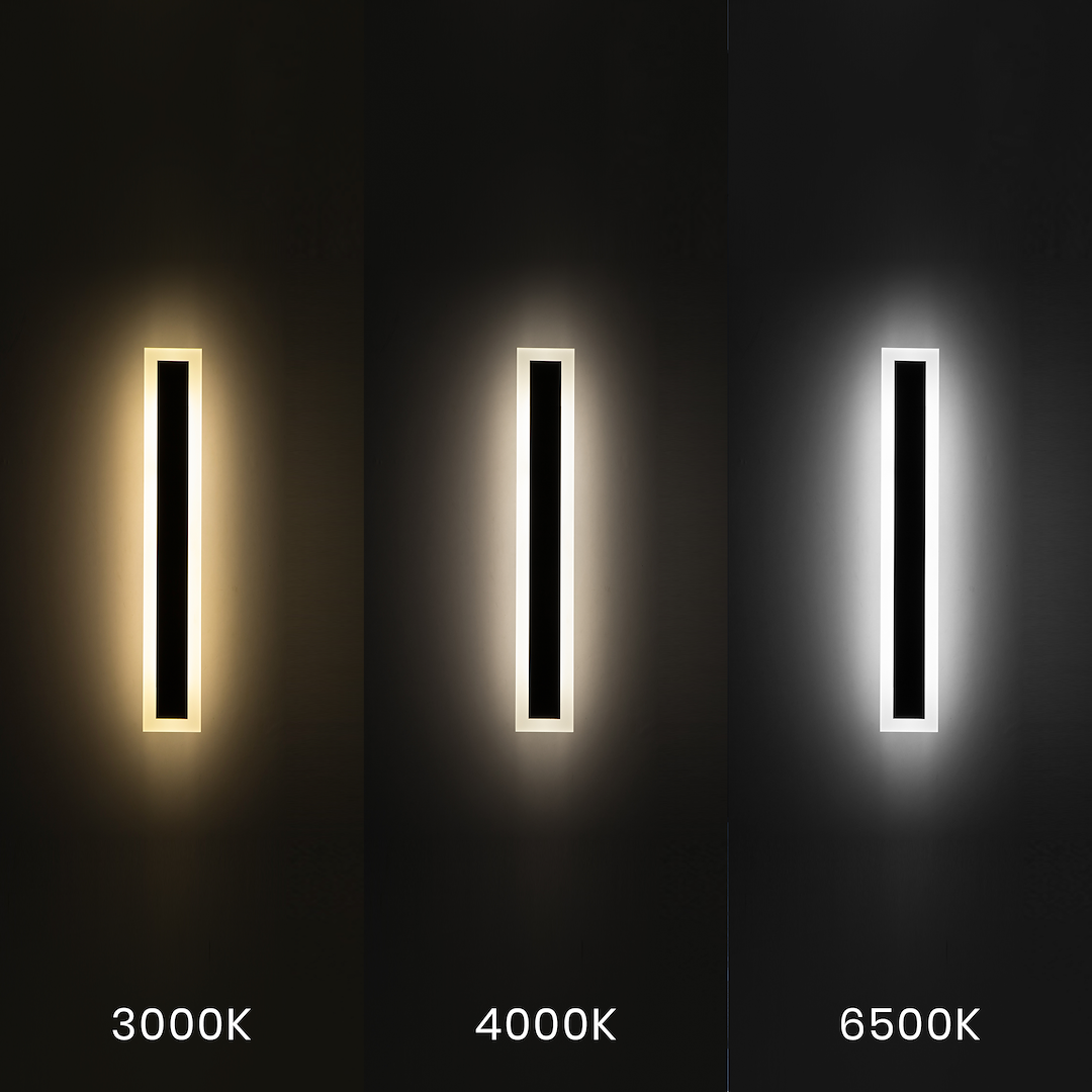 Kinkiet elewacyjny LED Wow 60, czarny, o mocy 20W CCT IP54, pokazany w trzech wariantach barwy światła: 3000K, 4000K i 6500K. Lampka ma prostokątny kształt z białą ramką wokół czarnego wnętrza, montowana na ścianie.
