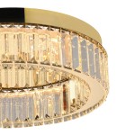 Lampa sufitowa LED Spark D40 w złotym wykończeniu, o średnicy 30W. Okrągła konstrukcja z przezroczystymi kryształowymi detalami, które odbijają światło, tworząc efektowną atmosferę. Widok z góry, podkreślający przestrzenny design.