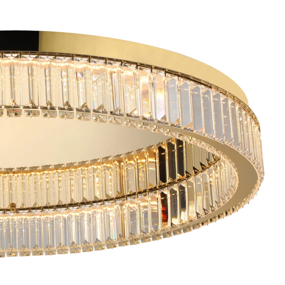 Lampa sufitowa LED Spark D80 o mocy 72W w złotym kolorze, z okrągłym korpusem i dekoracyjnymi kryształkami. Ujęcie z boku, ukazujące szczegóły wykończenia i blasku. Idealna do nowoczesnych wnętrz.