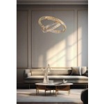 Lampa wisząca Spark D80+D60 z dwoma źródłami LED, 120W, w złotym kolorze. Charakterystyczne okręgi z transparentnym akrylem, zawieszone nad stolikiem w eleganckim wnętrzu z kanapą i dekoracjami.
