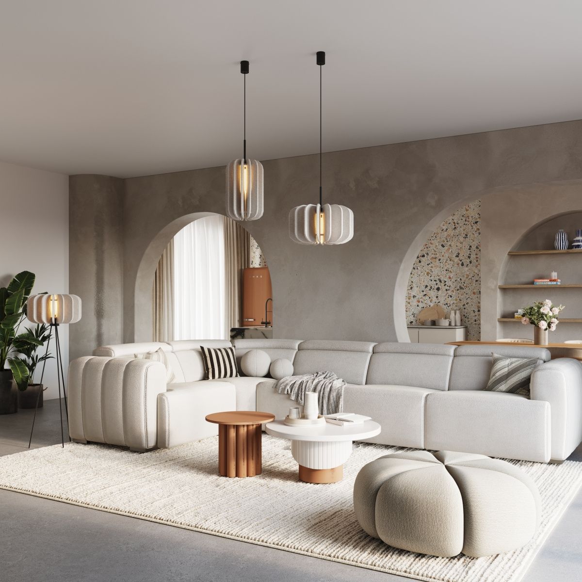 Lampa wisząca Mula D27 w czarnym i beżowym kolorze, z pojedynczym źródłem światła E27. Zawieszona w nowoczesnym wnętrzu, na tle ściany o teksturze betonu, obok jasnej sofy i stolika kawowego. Wysoka, cylindryczna forma z przezroczystym kloszem.