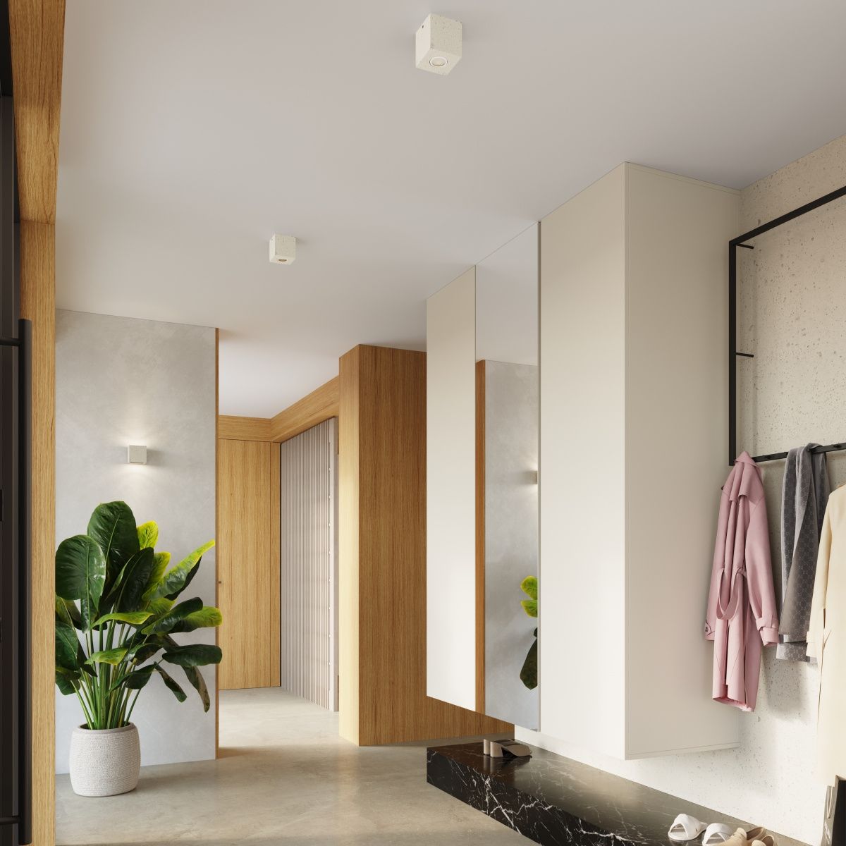 Beżowa lampa sufitowa Quad Beton 1xGU10, o kwadratowym kształcie, zamontowana na białym suficie, w nowoczesnym wnętrzu z drewnianymi akcentami. W tle widoczne rośliny oraz lustra, tworzące przytulną aranżację.