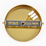 Złota lampa sufitowa Cristal z pięcioma gniazdami E14. Widok od spodu, z metalowym uchwytem montażowym i białymi złączkami elektrycznymi. Gładka, błyszcząca powierzchnia, okrągły kształt.