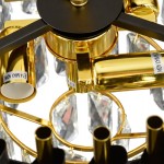 Lampa sufitowa Cristal w kolorze złotym, z pięcioma gniazdami E14. Widoczna struktura z metalowymi elementami i przezroczystymi kryształkami. Ujęcie z dołu, ukazujące detale mocowania oraz oznaczenia maksymalnej mocy 40W.