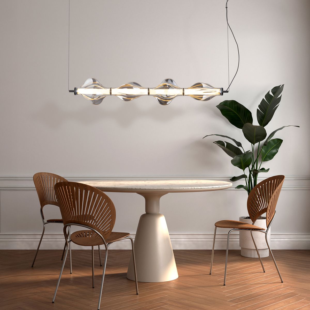 Lampa wisząca LED Elva 30W 3000K w kolorze czarnym/grafitowym, z sześcioma szklanymi kloszami w kształcie kropli, zawieszona nad okrągłym stołem. W tle widoczne krzesła z designerskim siedziskiem i roślina doniczkowa.